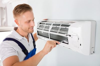 Important-Considerations-for-AC-Installation-and-Update – Copy HVAC technician cleaning and repairing a ductless mini split AC in Wheat Ridge, CO